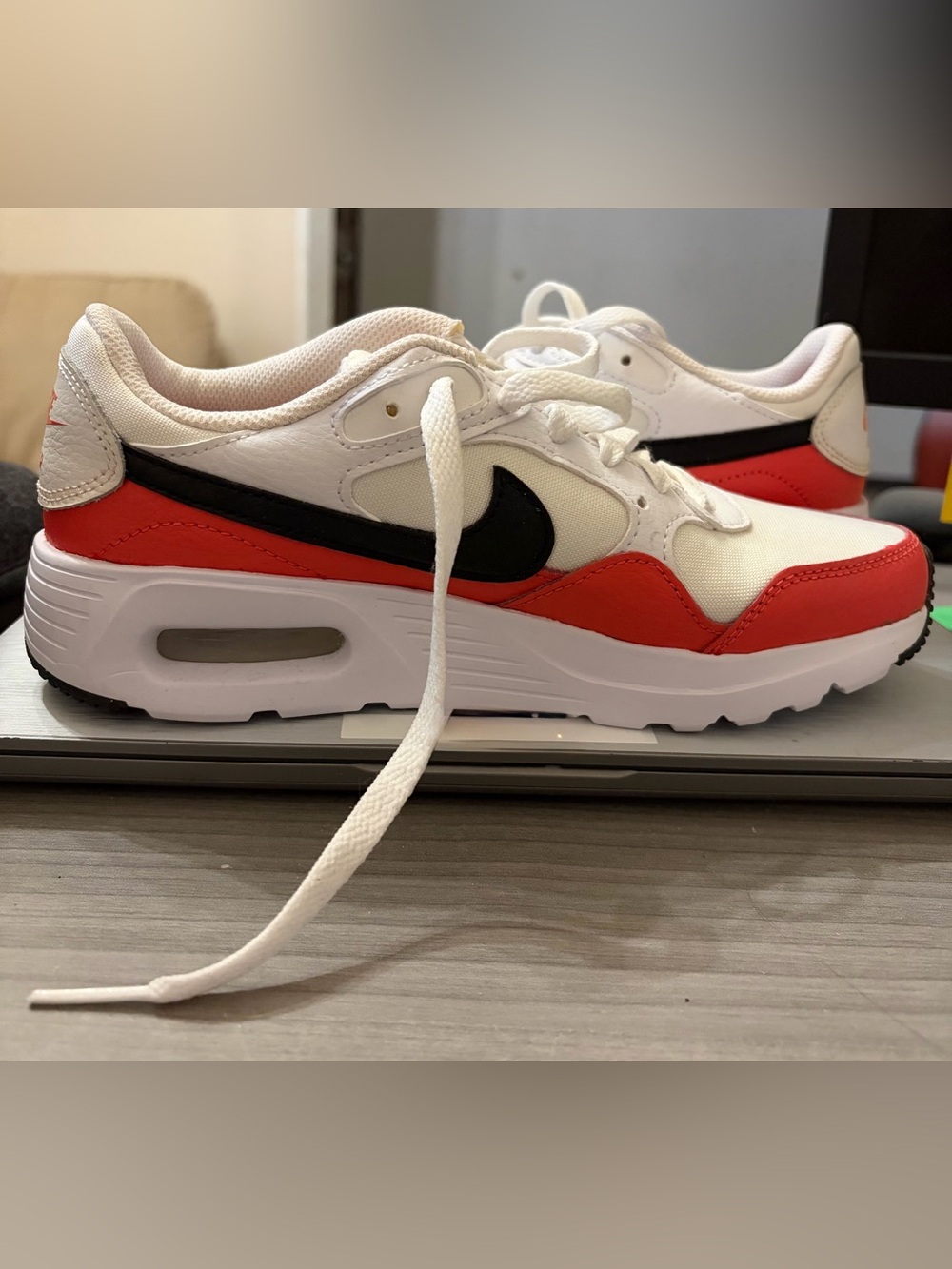 6.5 Nike air maxes coral pink color. Never worn.